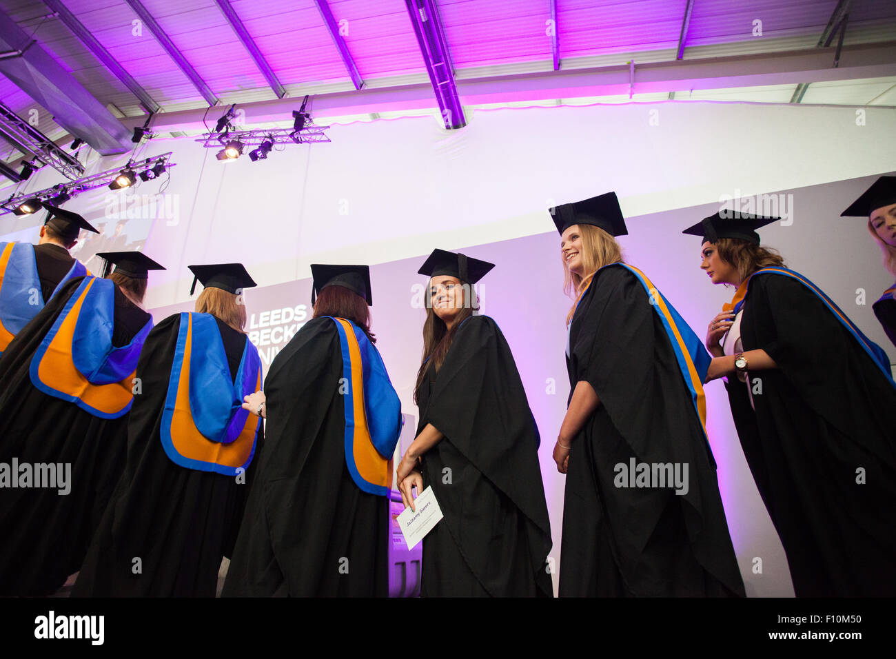 graduating students in cap and gown Stock Photo - Alamy