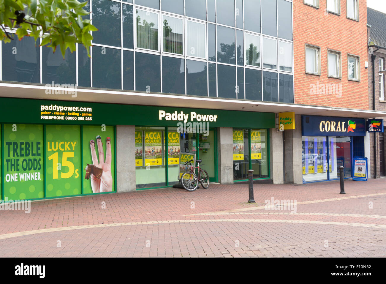 Paddy Power and Coral bookmakers next door to each other in the town centre in Bedford, Bedfordshire, England Stock Photo