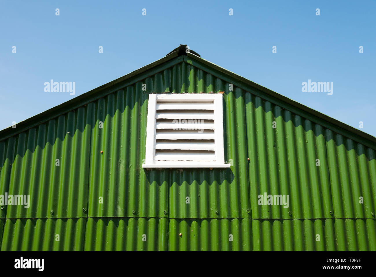 Abstract close up of a green painted corrugated iron shed at Bembridge