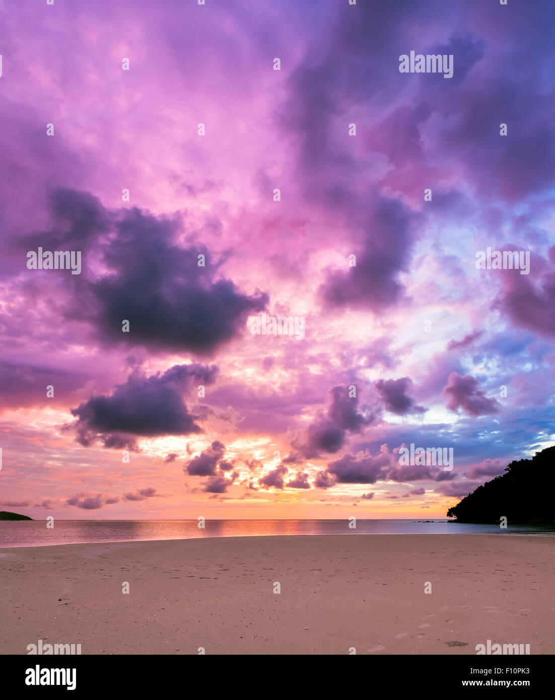 Colorful majestic sunset at sand beach borneo Stock Photo