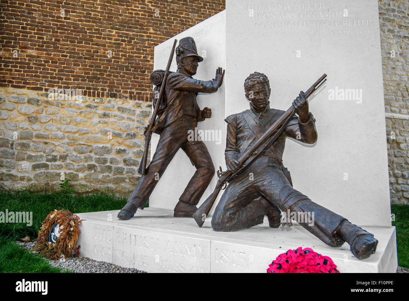 Memorial with soldiers by Vivien Mallock at the Château de Hougoumont, where British soldiers faced Napoleon's Army at Waterloo Stock Photo