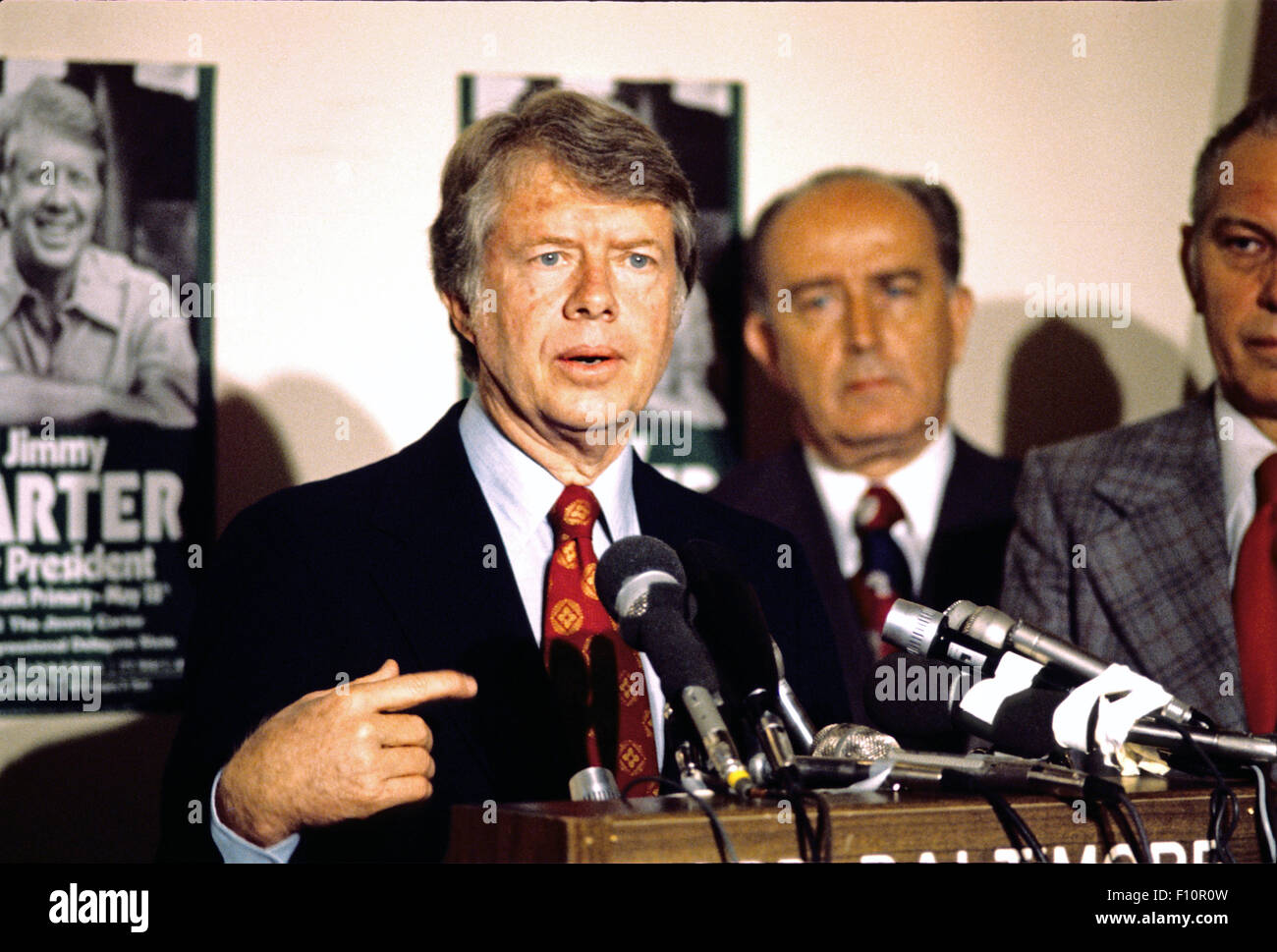 Governor Jimmy Carter (Democrat of Georgia) a candidate for the 1976 Democratic nomination for President of the United States, makes a campaign appearance in Baltimore, Maryland on May 13, 1976. Standing at right is Mayor William Donald Schaefer (Democrat of Baltimore), and Secretary of State Fred L. Wineland (Democrat of Maryland) who is partially obscured. Credit: Arnie Sachs/CNP - NO WIRE SERVICE - Stock Photo