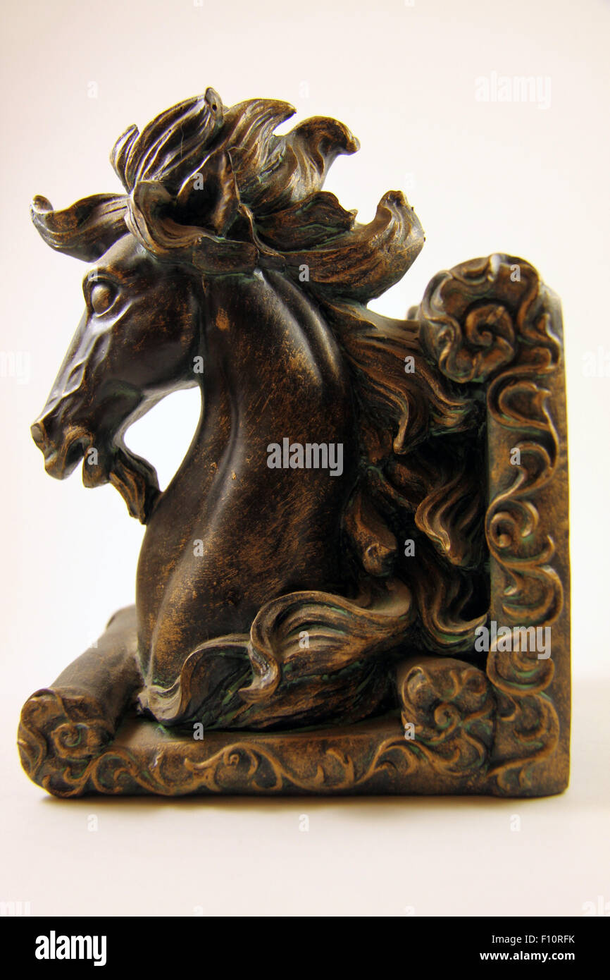 Brass horse head with flowing mane bookend Stock Photo - Alamy