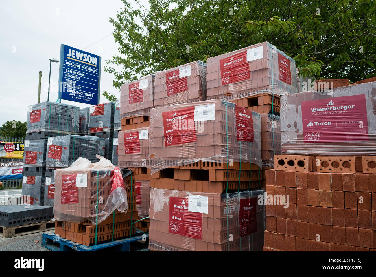 Stacks of bricks at a branch of Jewson builders merchants UK Stock