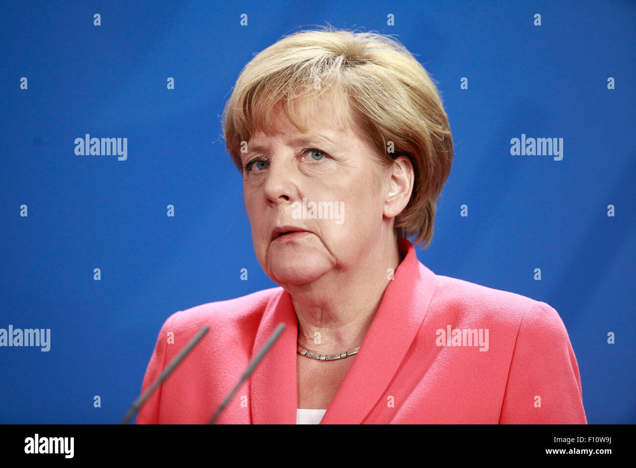 Berlin, Germany. 24th Aug, 2015. German Chancellor Angela Merkel, French president François Hollande and Ukrainian president Petro Poroschenko give a joint press conference after meeting at the German Chancellery in Berlin Germany on 24 August 2015. / Picture: Angela Merkel, German Chancellor Credit:  Reynaldo Chaib Paganelli/Alamy Live News Stock Photo
