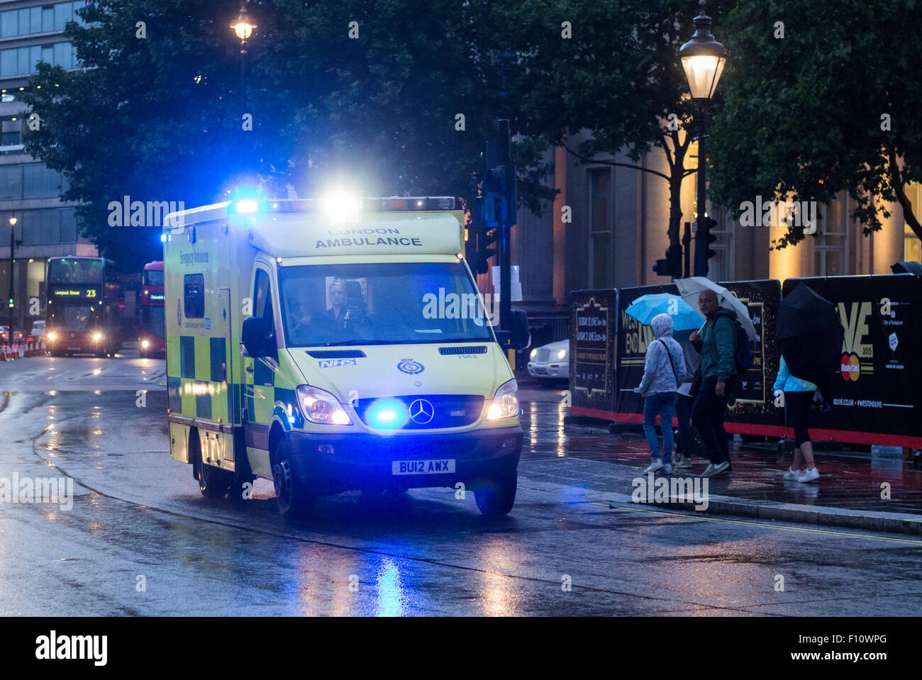 London Ambulance Service responding in bad weather Stock Photo