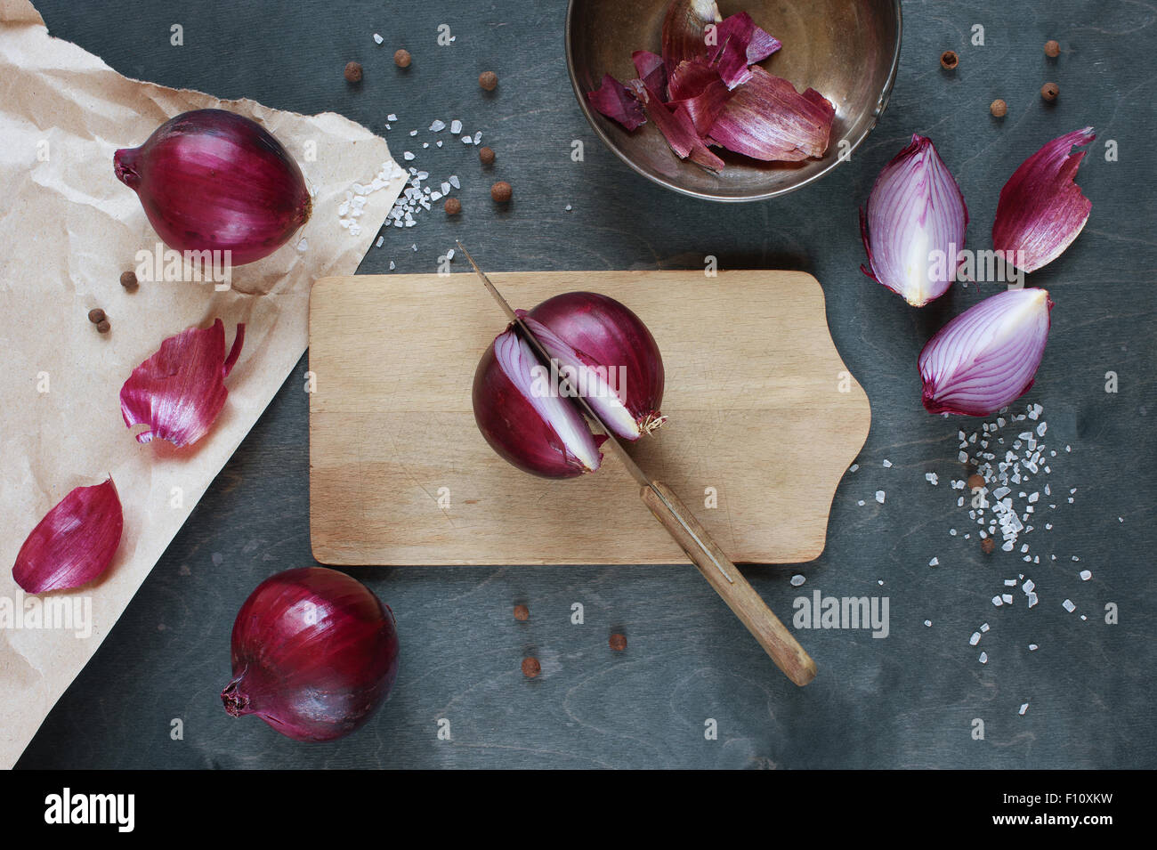 Red onion on the wooden table Stock Photo - Alamy