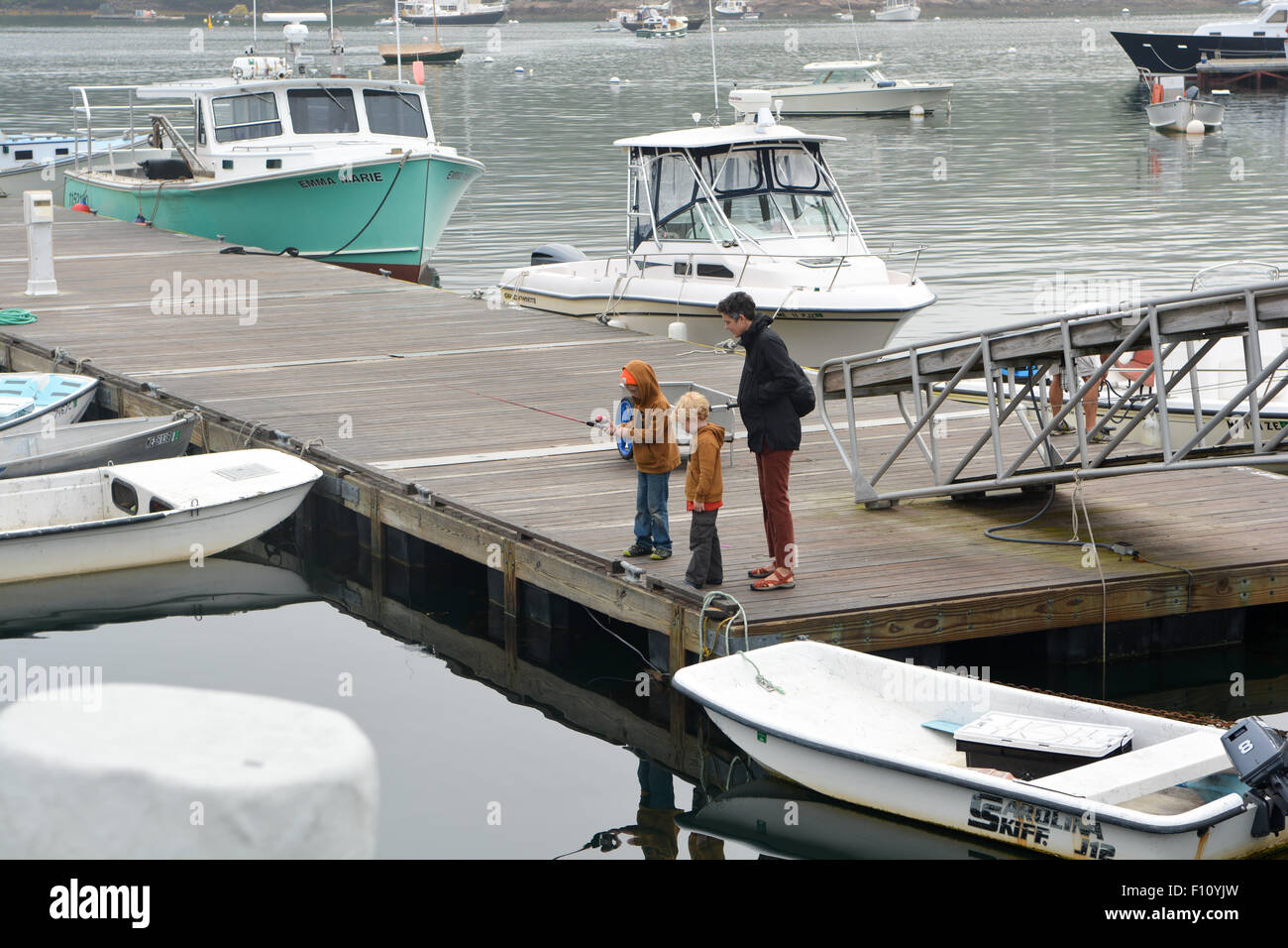 Fishing in harbour Maine USA Stock Photo