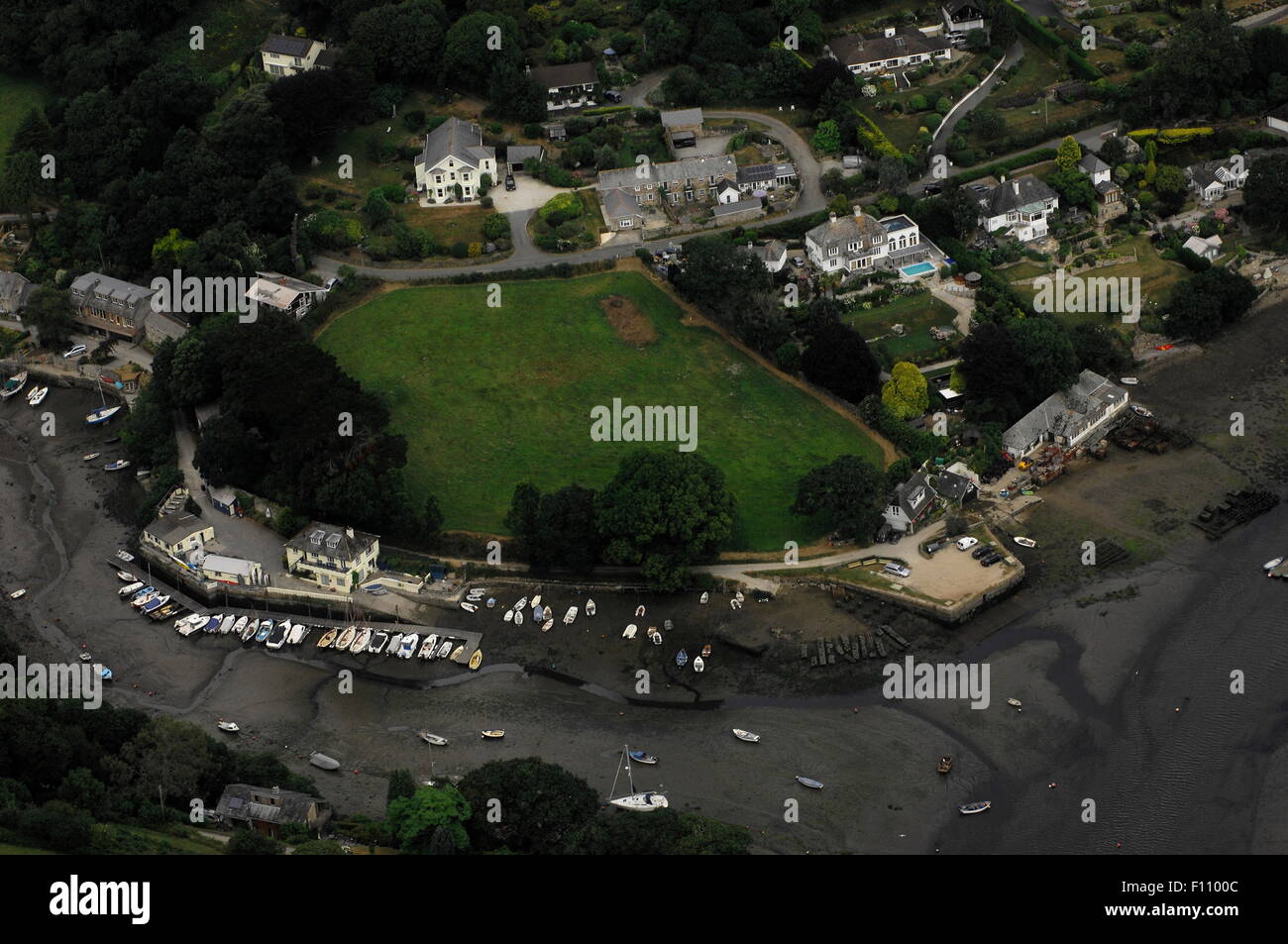 AJAXNETPHOTO. 23RD JULY, 2013. PORT NAVAS, CORNWALL, ENGLAND. - AERIAL VIEW OF THE VILLAGE AND QUAY ON THE HELFORD RIVER. PHOTO:JONATHAN EASTLAND/AJAX REF:D2X 132307 3187 Stock Photo