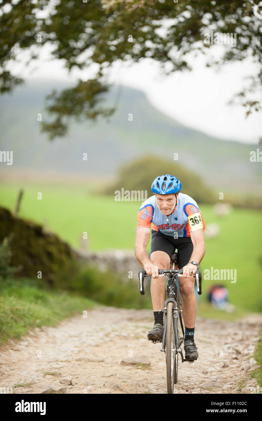 A rider in the Three Peaks Cyclocross in the Yorkshire Dales National Park. Stock Photo