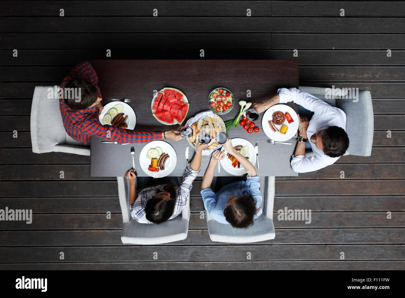 two couples eating dinner Stock Photo Alamy two couples eating dinner Stock Photo Alamy