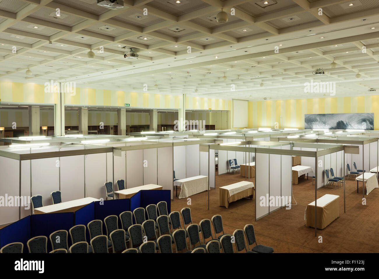 Trade show interior with booth and tables Stock Photo