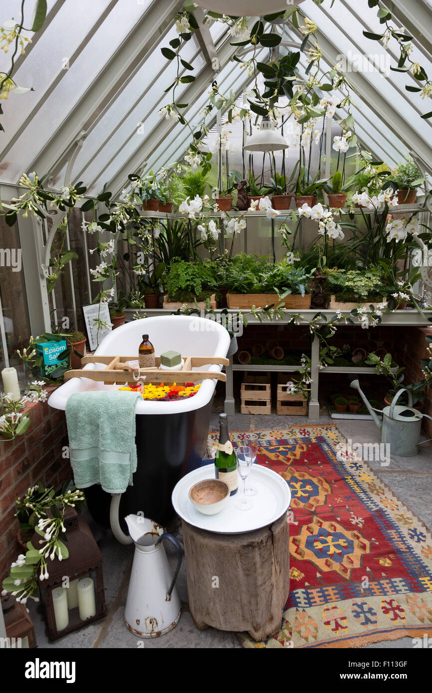 Greenhouse with a bathroom and bath tub at Chelsea Flower Show, London