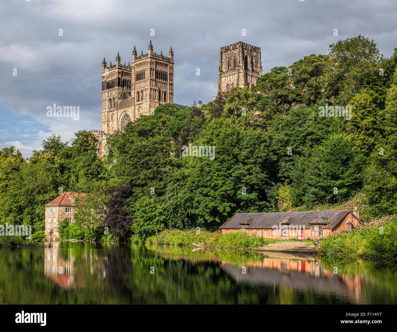 Glorious sunny view of boat houses on the river Wear and Durham Cathedral. Stunning reflections in the water of the river Stock Photo