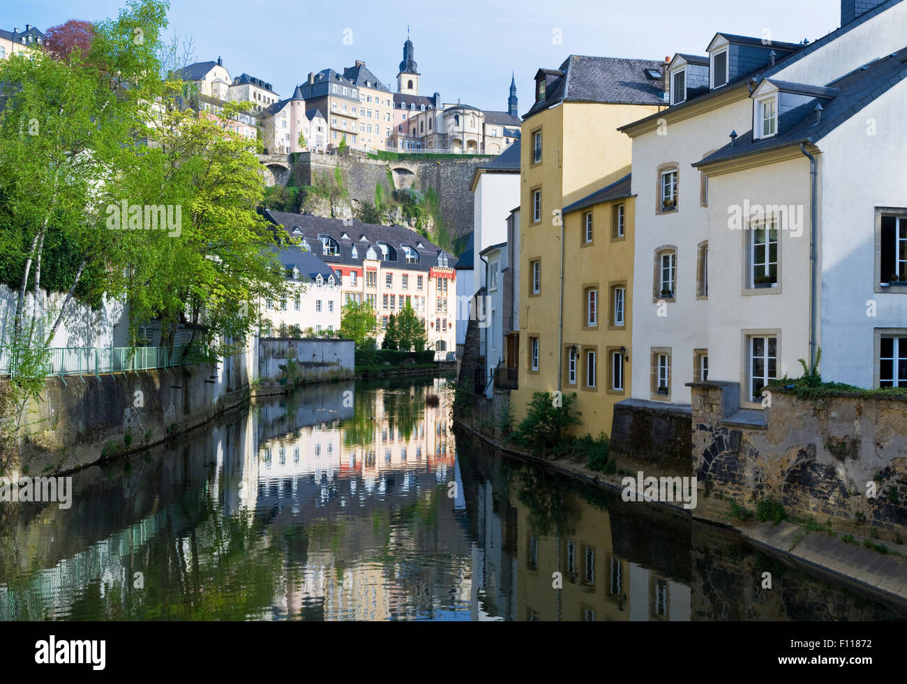 The Alzette River flowing through The Grund area in Luxembourg City with the famous Italian restaurant, Mosconi, on the right Stock Photo