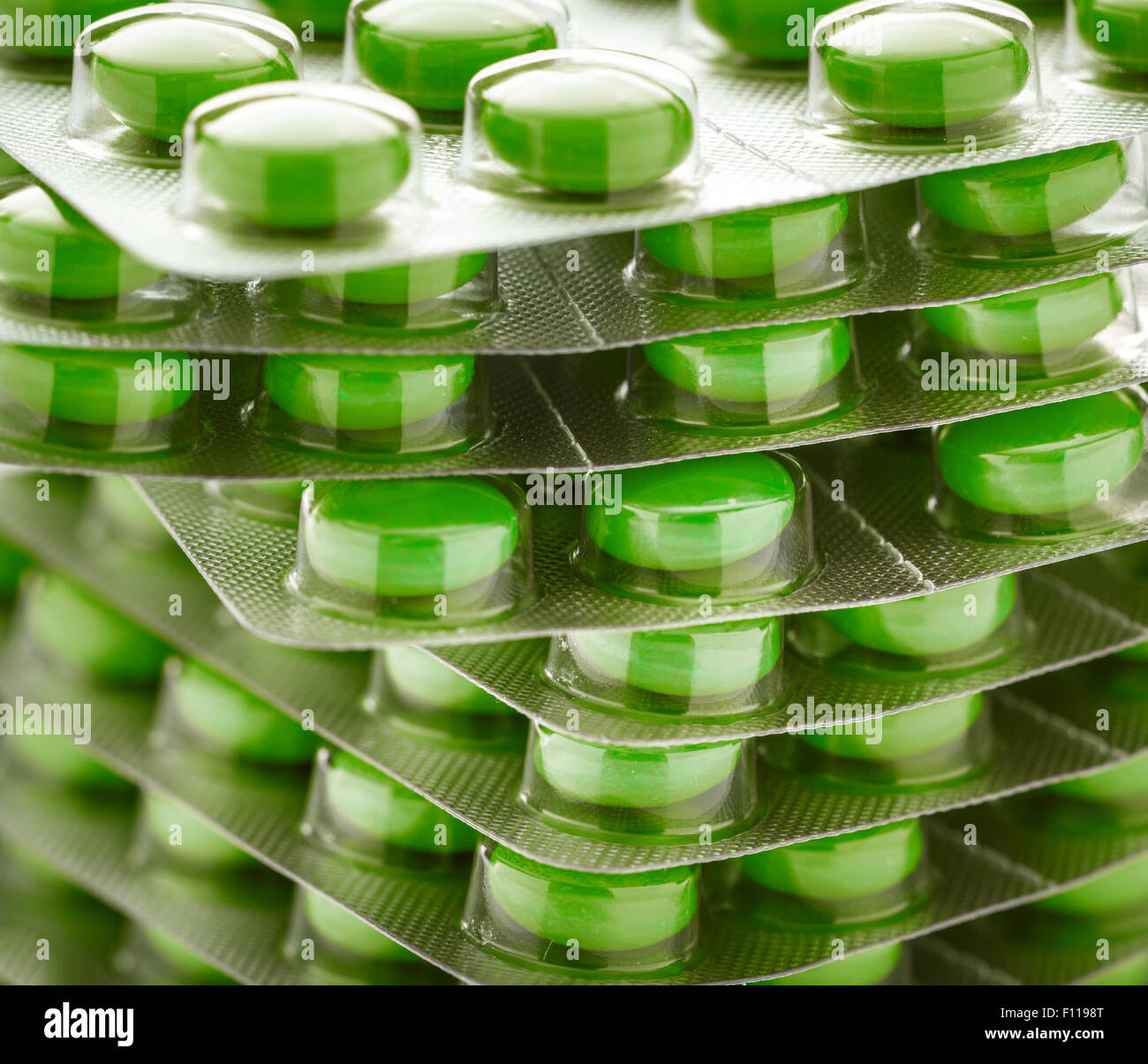 Colourful tablets in plastic packing as background Stock Photo - Alamy