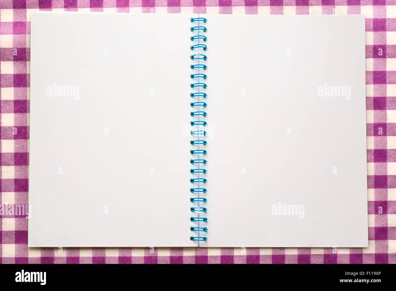 Blank open notepad on the cloth background Stock Photo - Alamy
