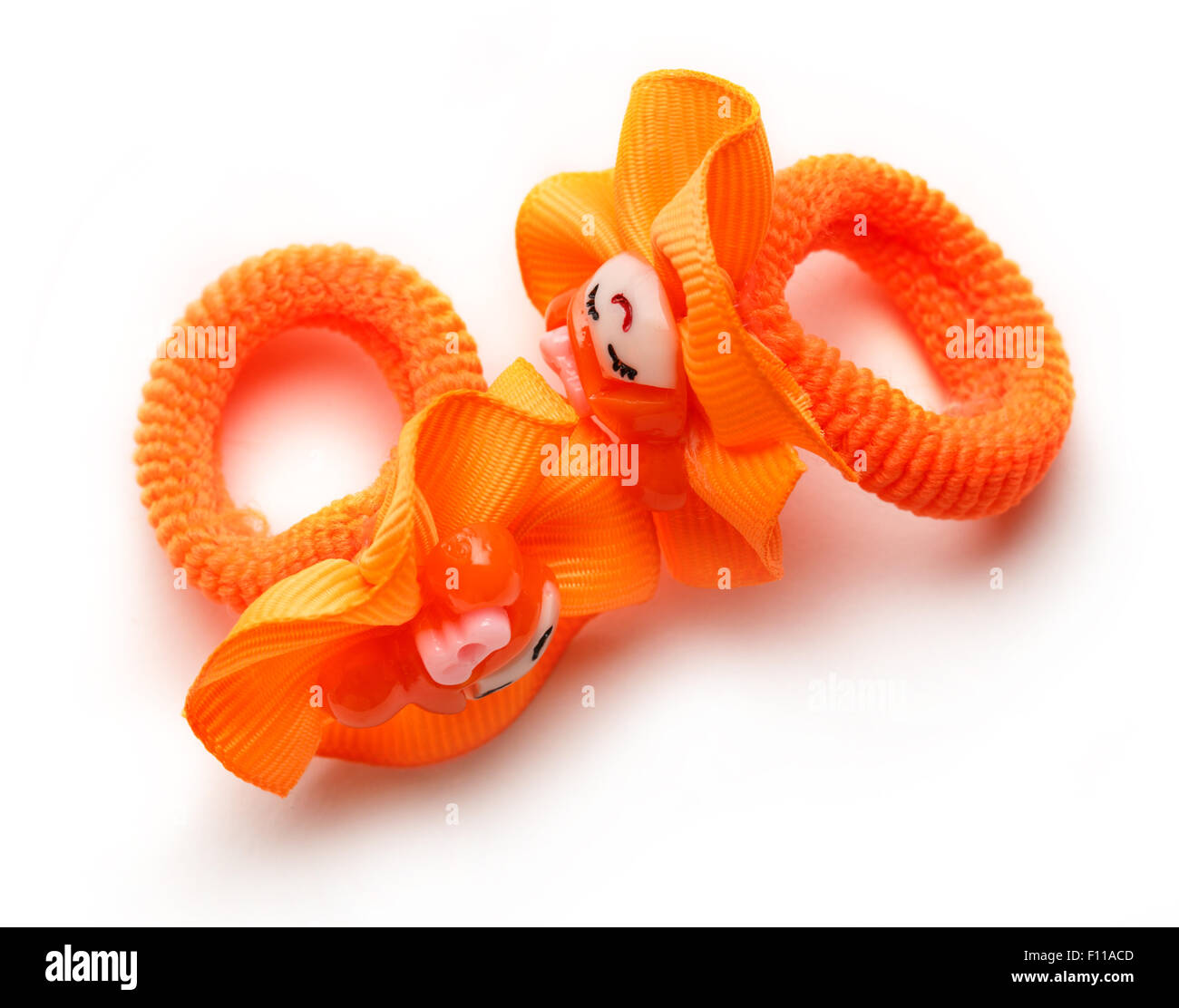 Orange rubber bands for a child on the white background Stock Photo