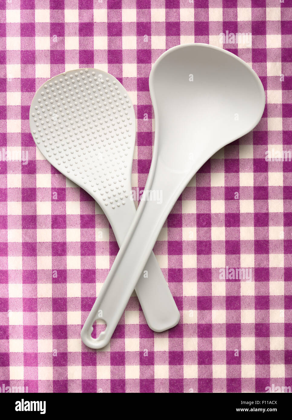 White spatula and ladle on the cloth background Stock Photo Alamy