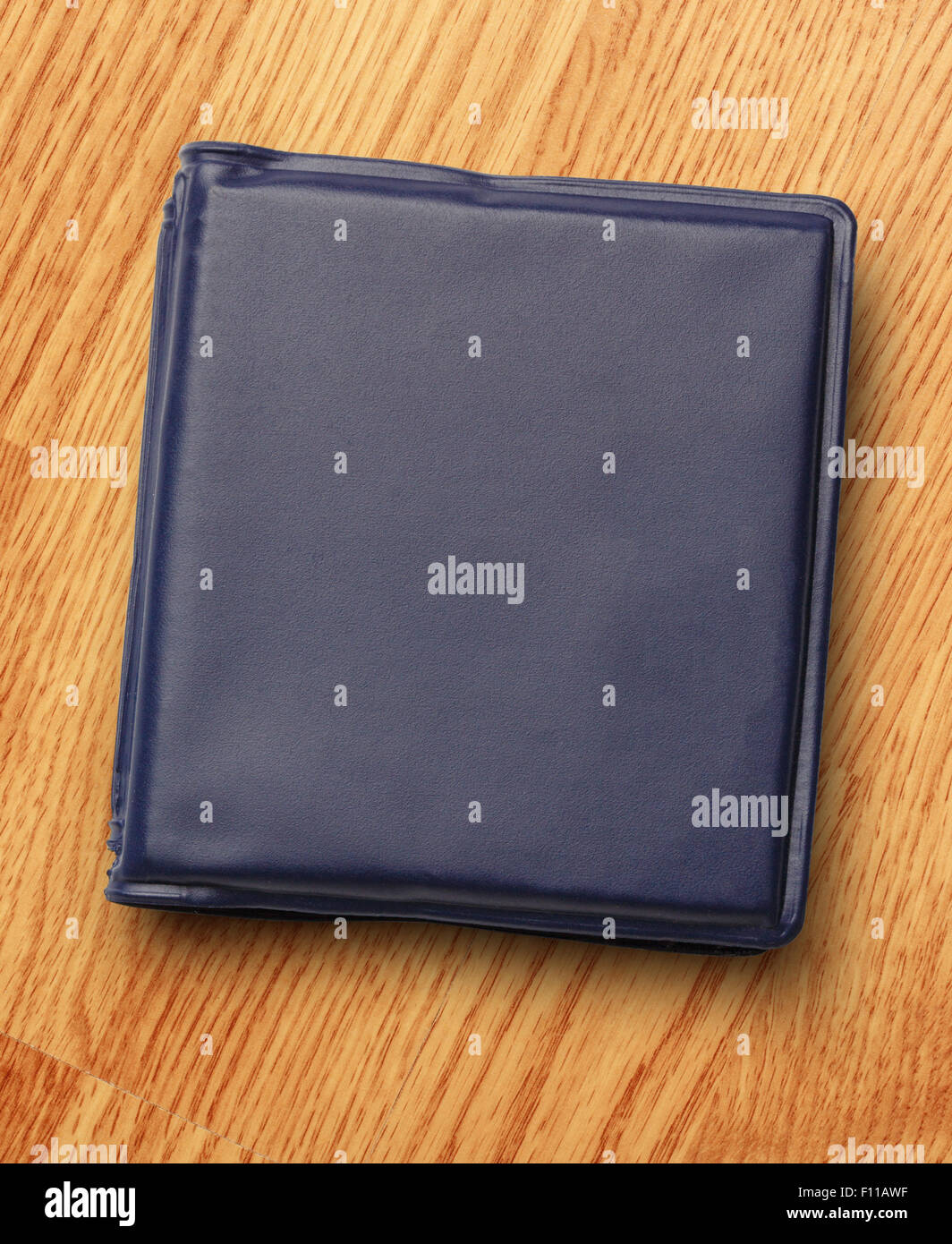 Dark blue notebook on the wooden background Stock Photo
