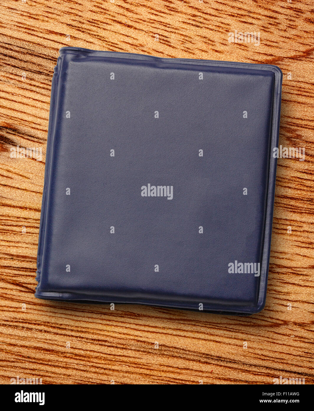 Dark blue notebook on the wooden background Stock Photo
