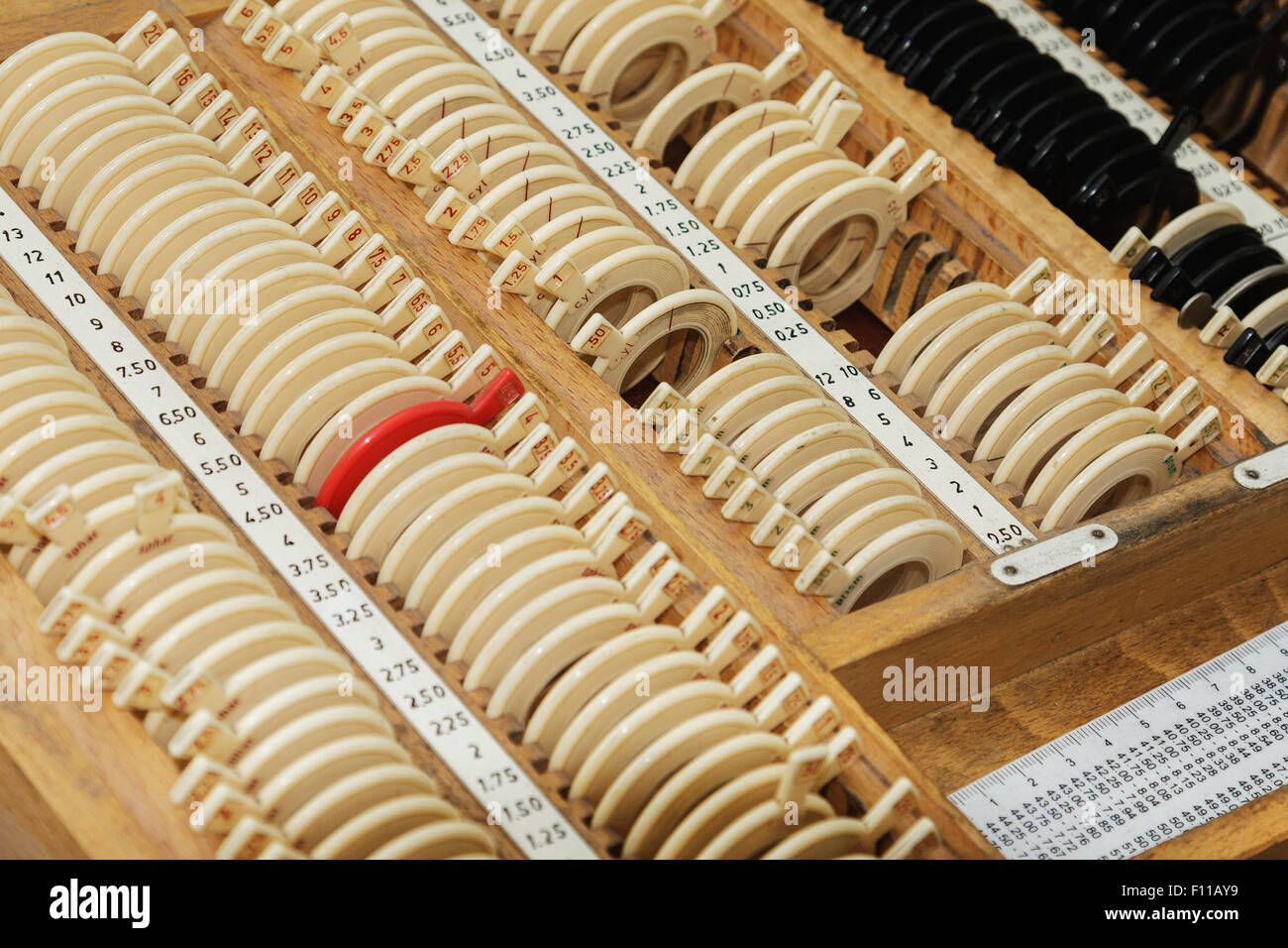 optician with set of trial frames and trial lenses Stock Photo