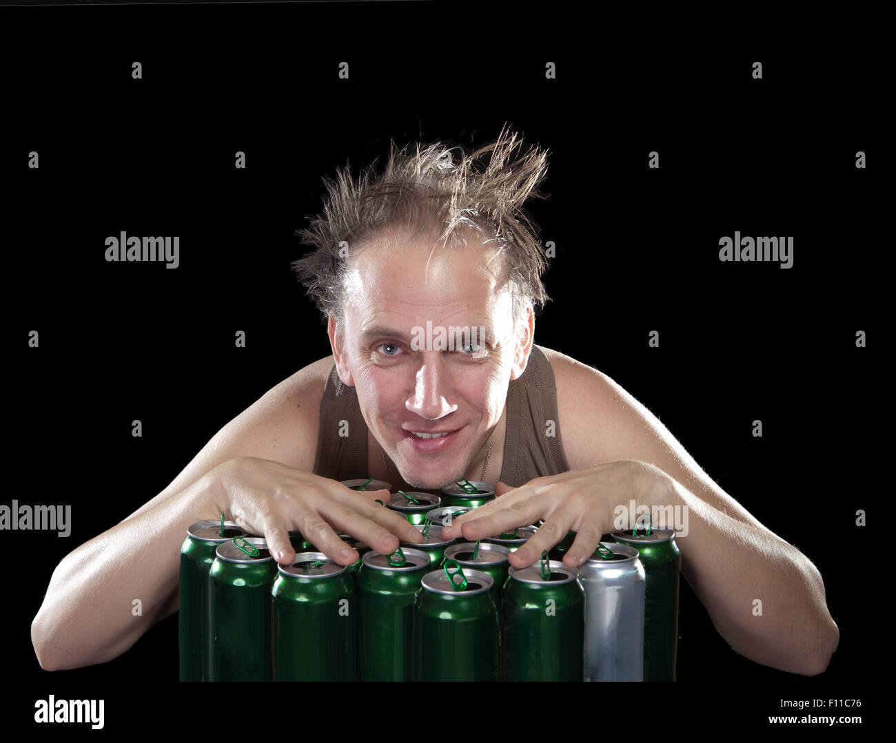 The happy tipsy man near empty beer cans Stock Photo Alamy