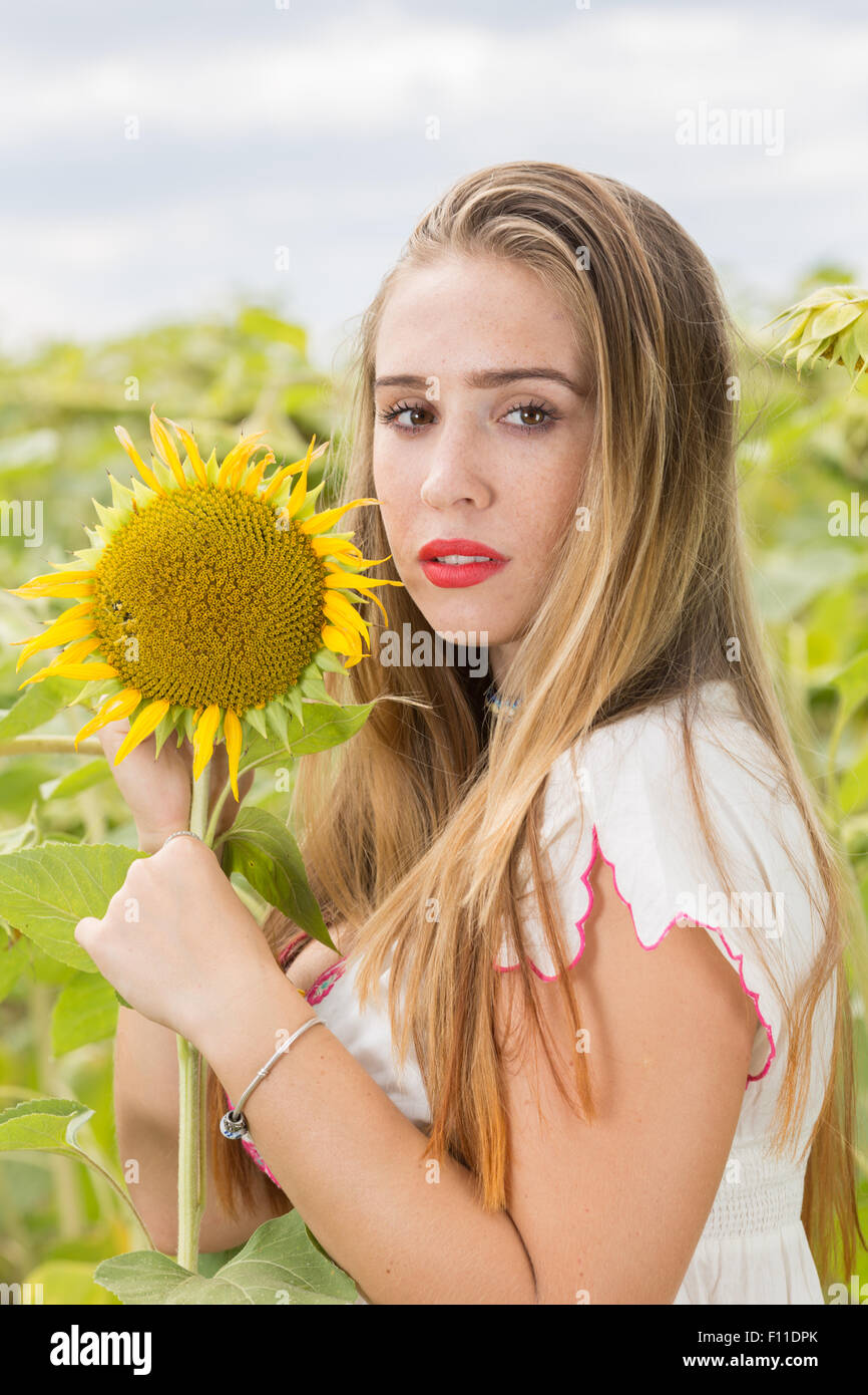 Girl with sunflower Stock Photo - Alamy