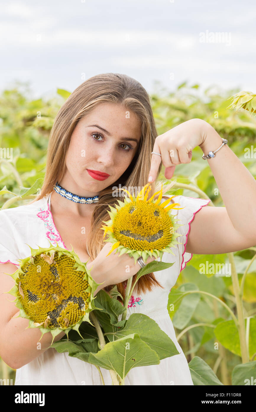 Girl with sunflower Stock Photo - Alamy