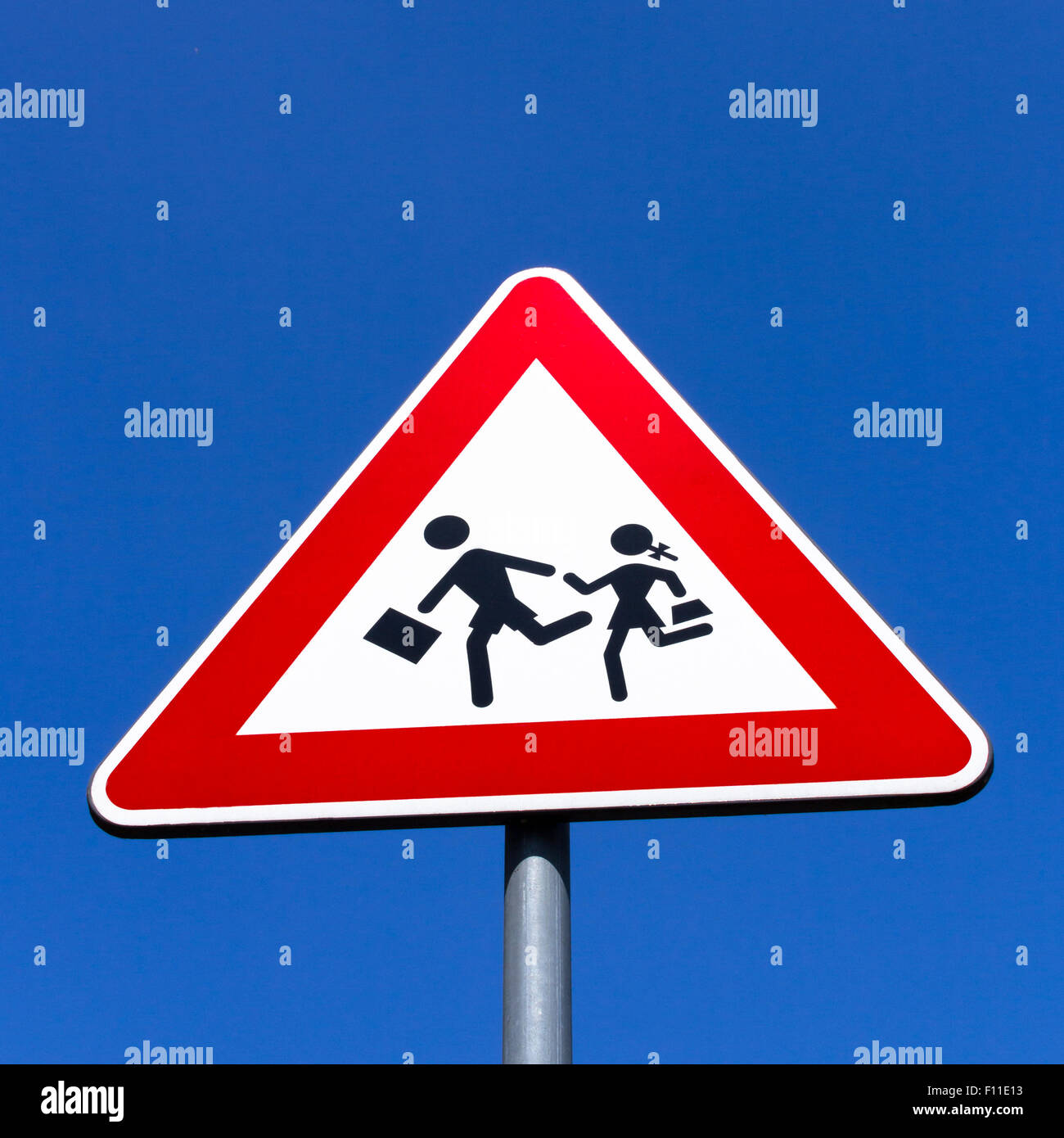 Road Sign of crosswalk of students, in vertical composition. Stock Photo