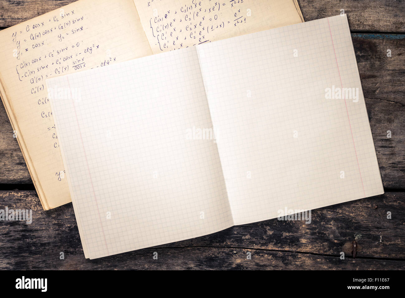 Open notebook on wooden background. Top view school background Stock Photo