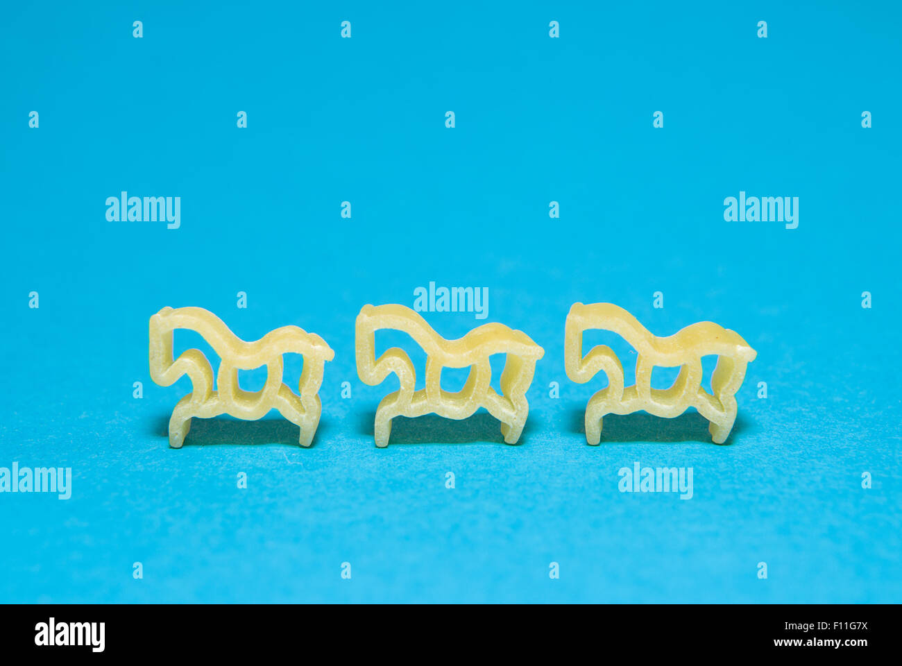 Pasta in the form of animals  on a blue background Stock Photo