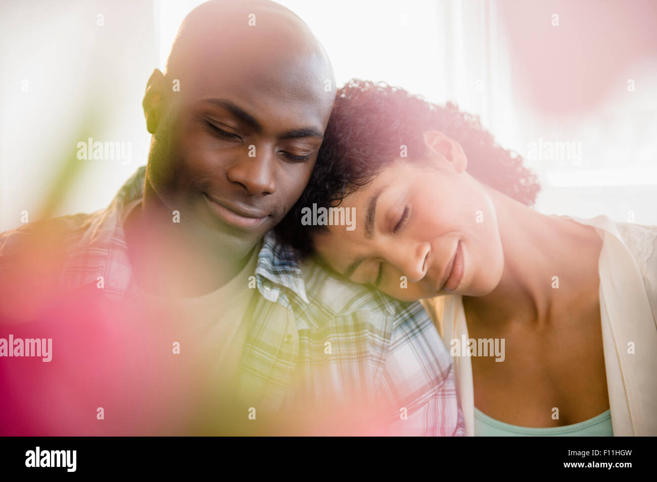 Close up of relaxing couple hugging Stock Photo