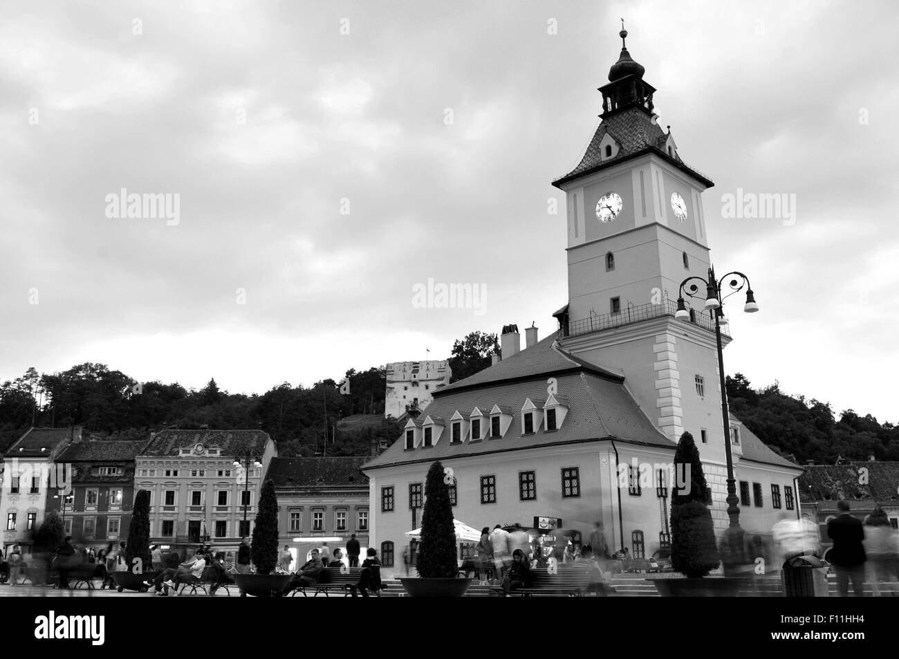 Brasov, Romania - June 28, 2015: Historic buildings overlook the main square of the old town of Brasov in Transylvania, Romania Stock Photo