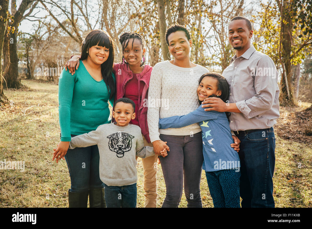 Black family smiling outdoors Stock Photo - Alamy