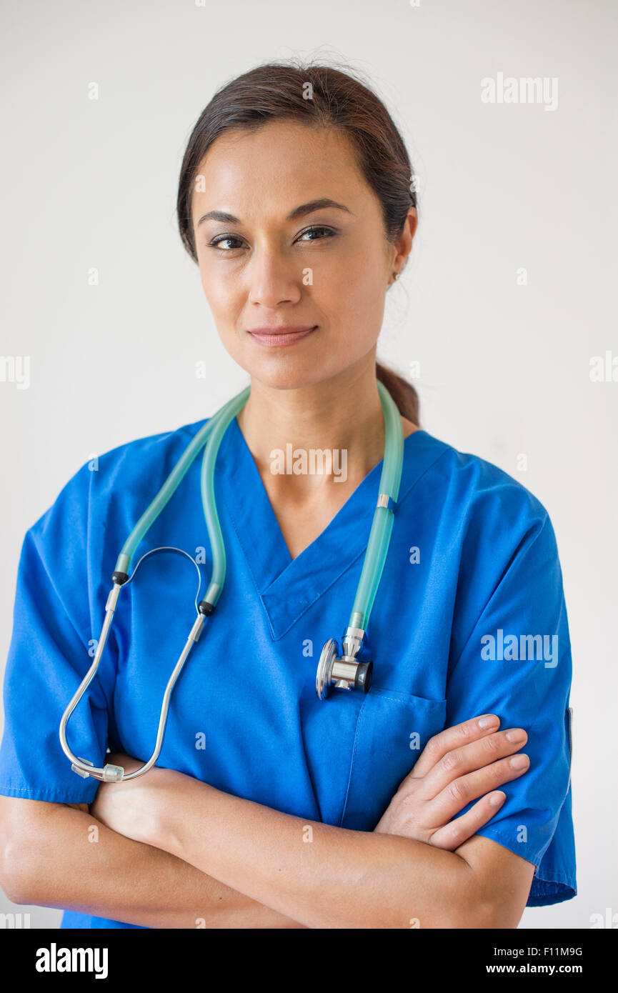 Mixed race nurse wearing stethoscope Stock Photo