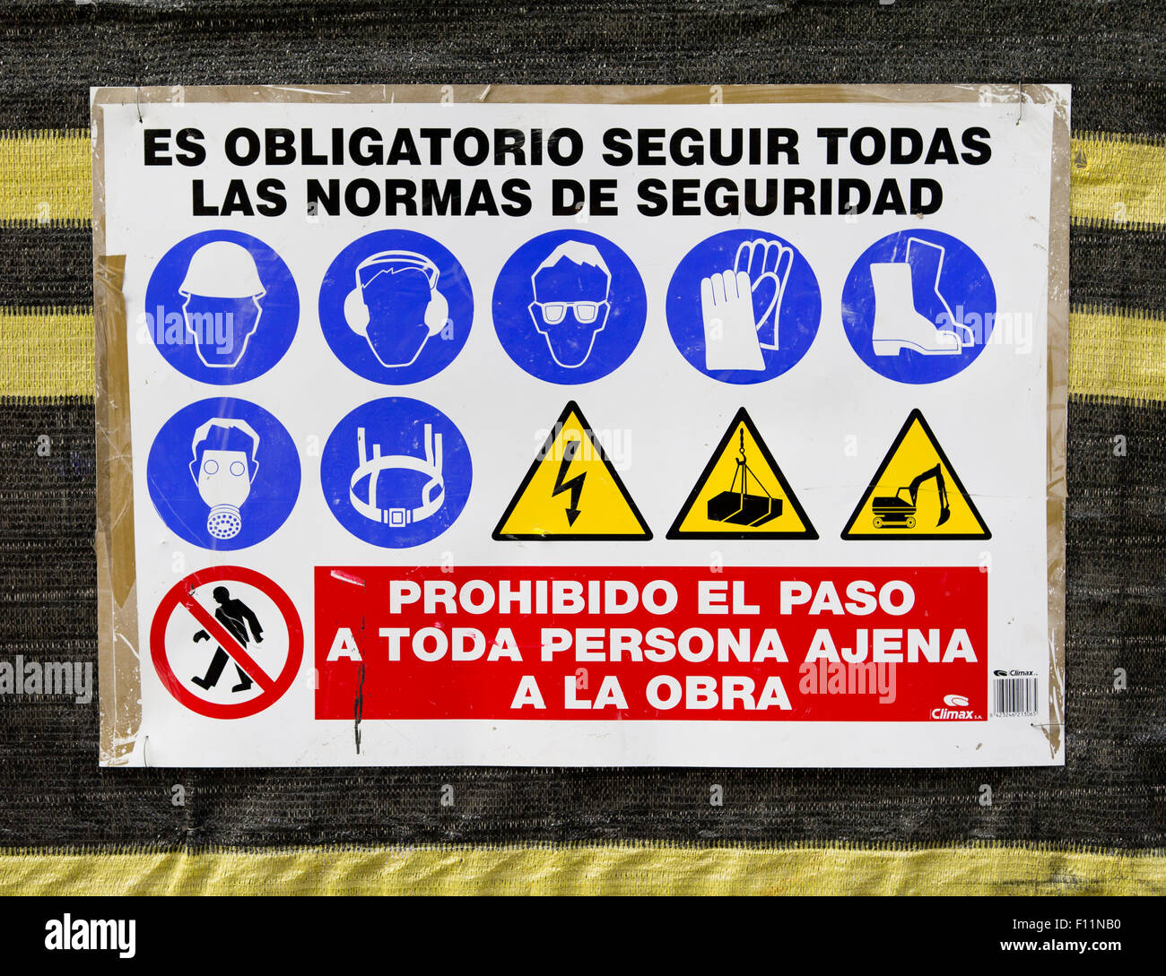 Spanish language construction site safety sign Stock Photo