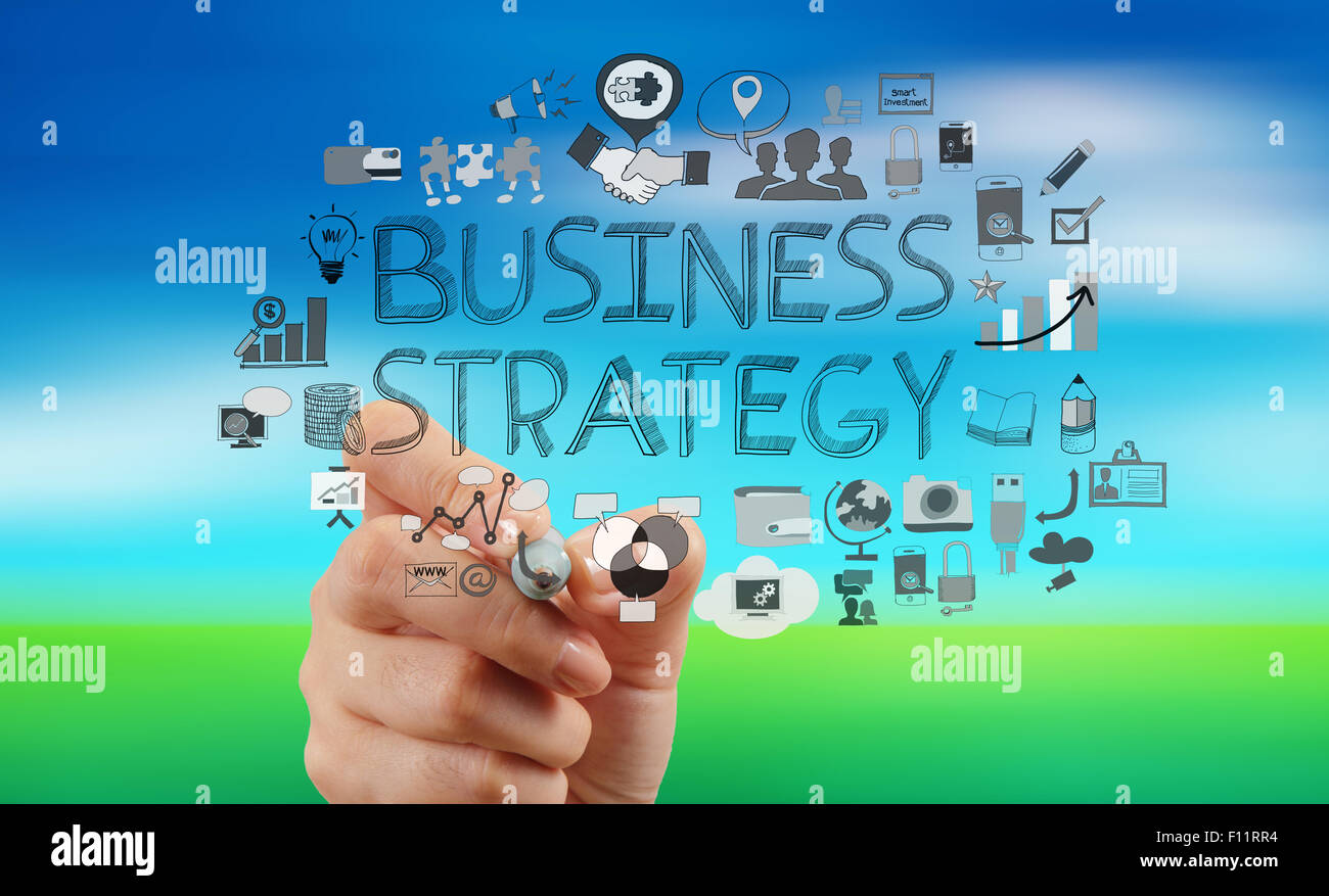 Computer Strategies businessman hand working with new modern computer and business strategy ...