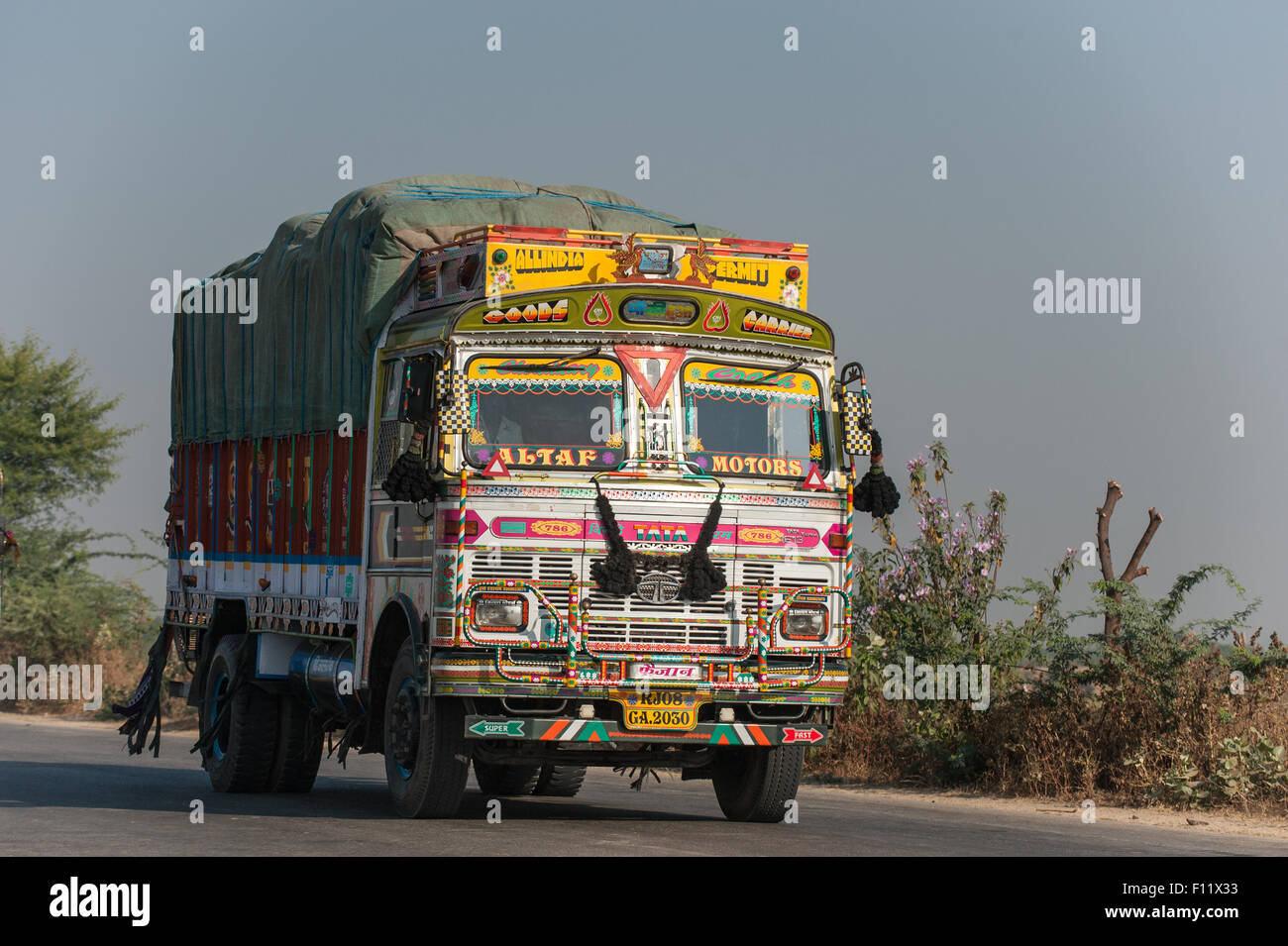 Rajasthan, India. Between Sawai Madhopur and Agra. Colouful decorated truck. Stock Photo