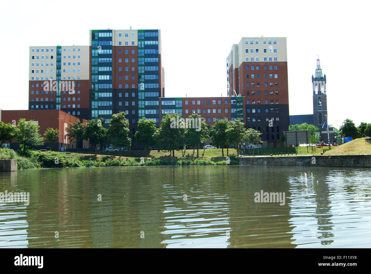 view of Roermond from the river Maas, with Stadhouder apartment buildings and St Christoffel