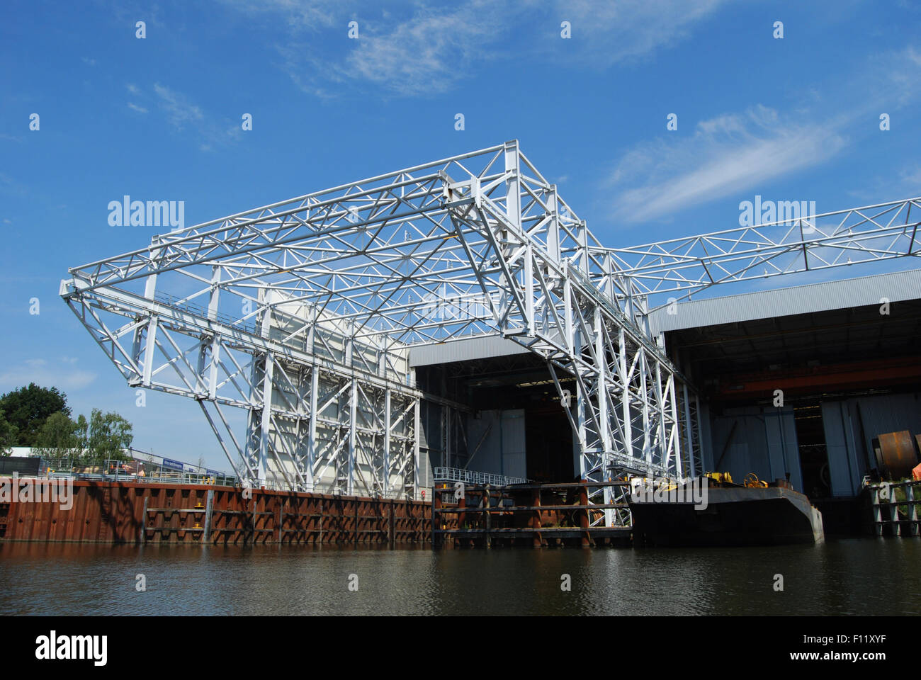 steel crane construction and loading dock for ships at SIF Roermond, Netherlands Stock Photo
