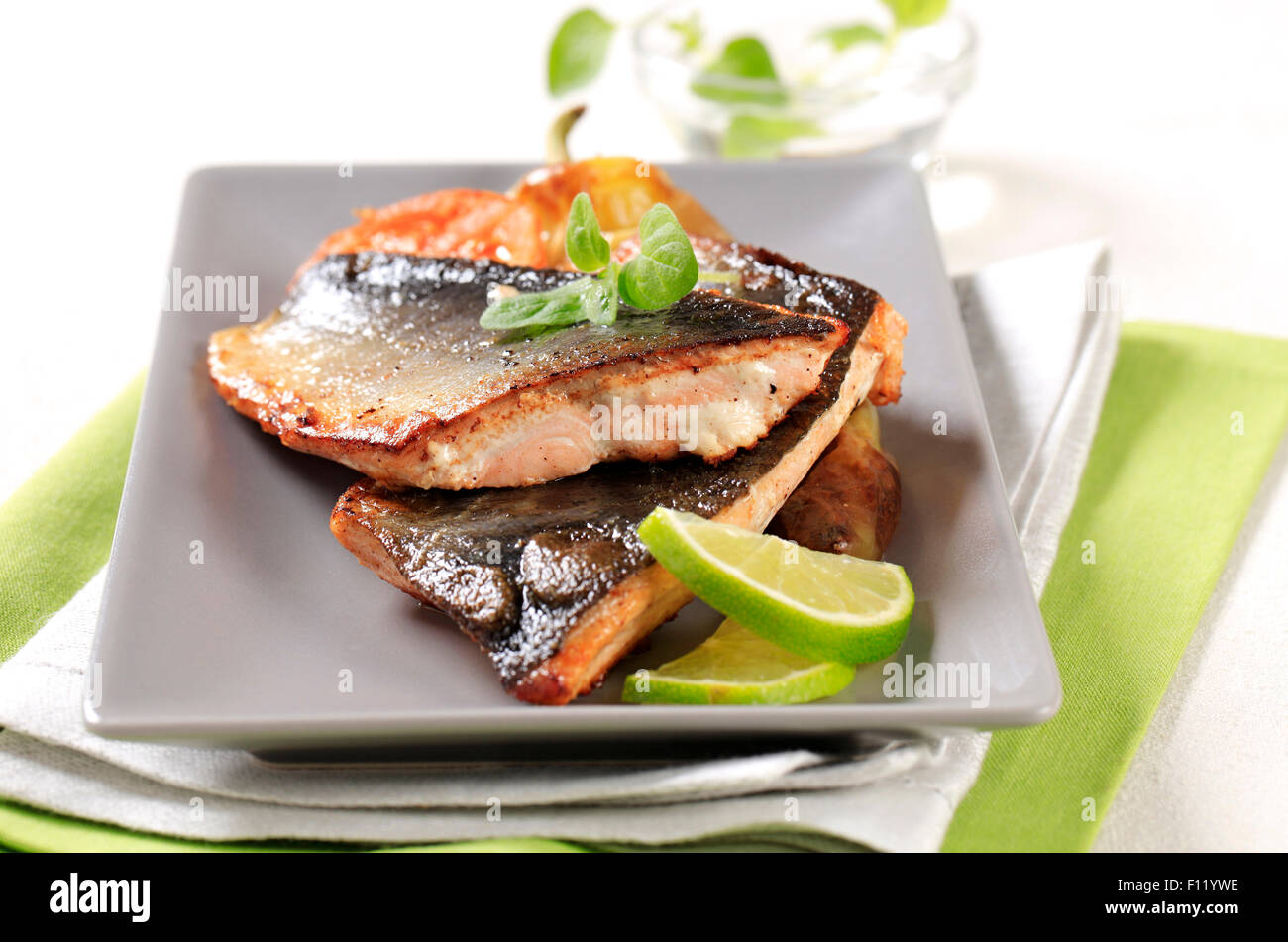 Pan fried trout fillets and vegetable garnish Stock Photo Alamy