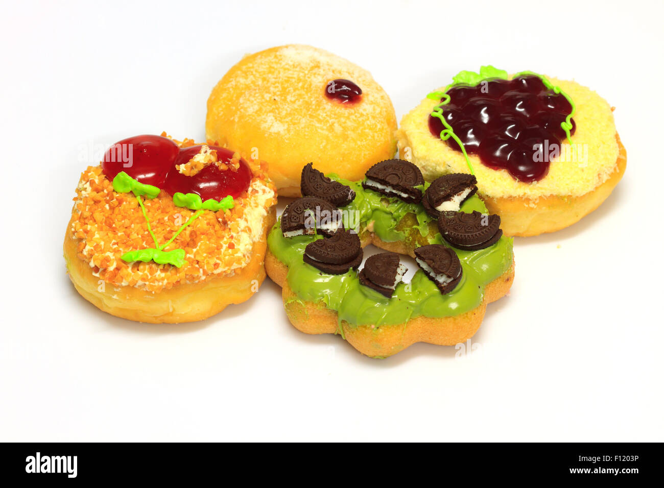 close up delicious Colorful donut on white background Stock Photo - Alamy