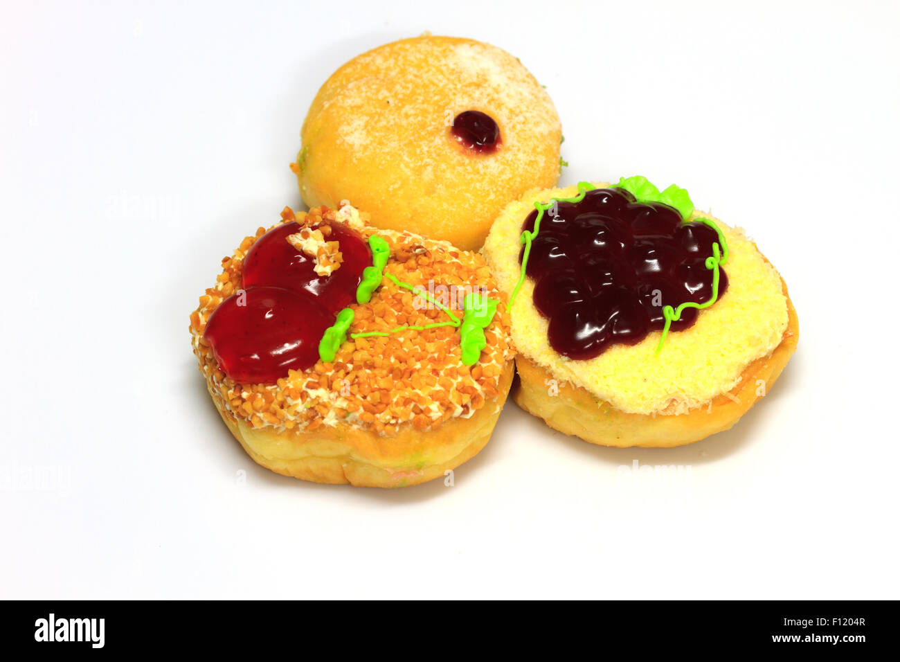 close up delicious Colorful donut on white background Stock Photo - Alamy