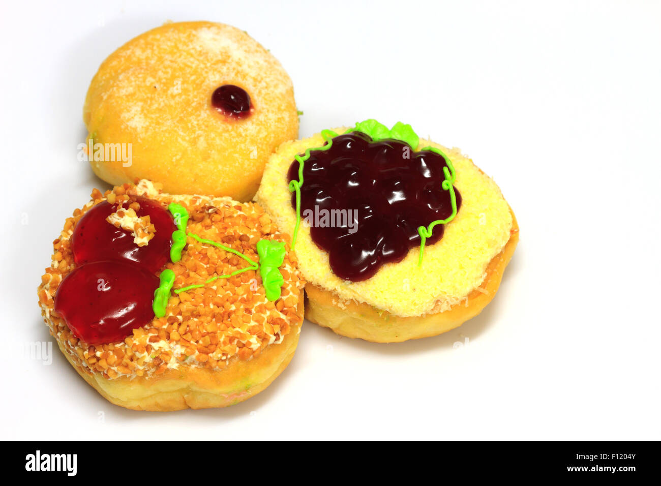 close up delicious Colorful donut on white background Stock Photo - Alamy