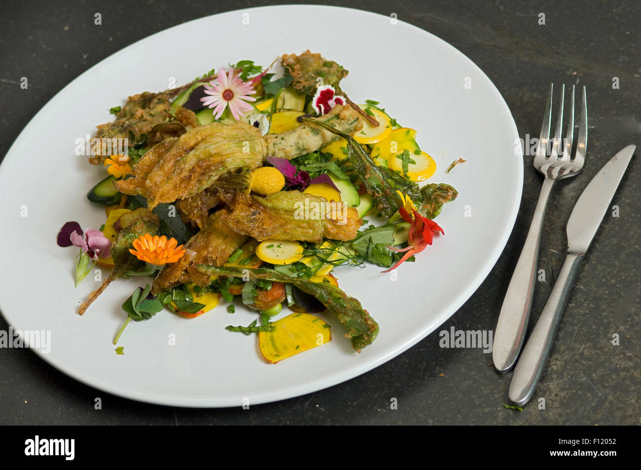 A salad of edible flowers including courgettes Stock Photo Alamy