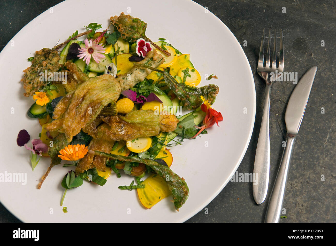 A salad of edible flowers including courgettes Stock Photo Alamy
