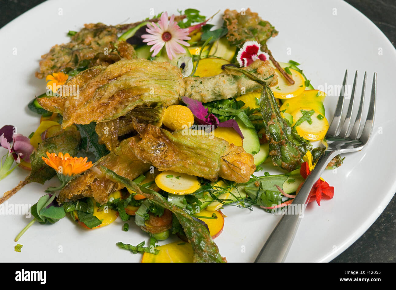 A salad of edible flowers including courgettes Stock Photo Alamy