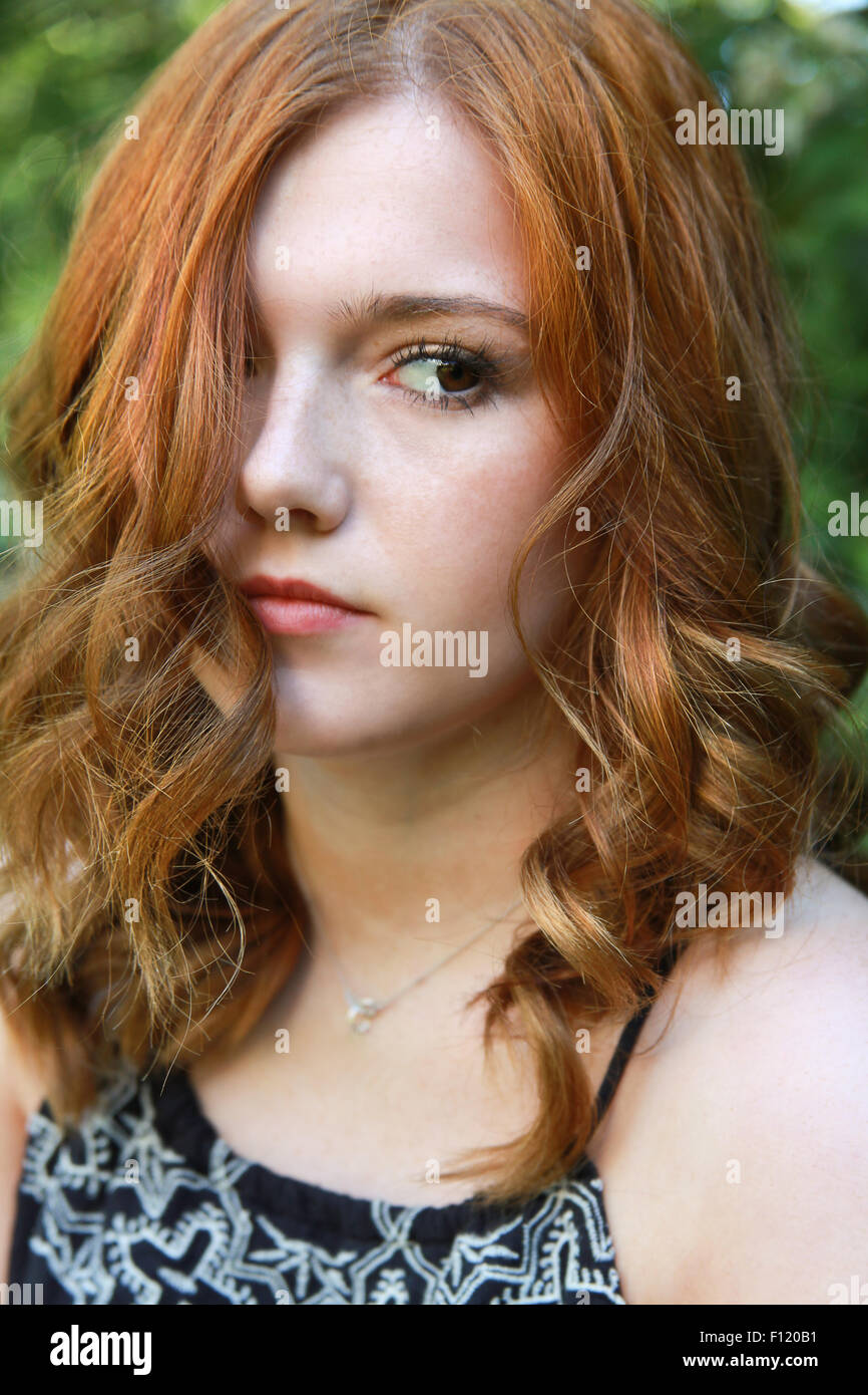 Portrait of a beautiful young woman with red hair Stock Photo