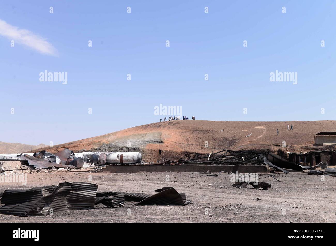 (150825) -- HERAT, Aug. 25, 2015 (Xinhua) -- Photo taken on Aug. 25, 2015 shows destroyed gas tankers after an explosion in Herat province, western Afghanistan. At least 11 people were killed while 18 others wounded after a reservoir of liquefied gas caught fire in Herat city, capital of western Afghanistan's Herat province overnight Monday, sources said on Tuesday. (Xinhua/Sardar) Stock Photo